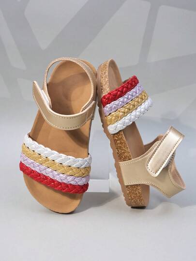 A Pair Of Girls' Sandals, Adorned With Colorful Woven Straps, Made Of Imitation Leather Material, Conforming To The Shape Of The Foot, With Open-Toe Low-Top Design, Secured With Hook And Loop, Featuring A Flat Heel Design, Resort-Style Sandals, Suitable For Beach Play And Casual Wear