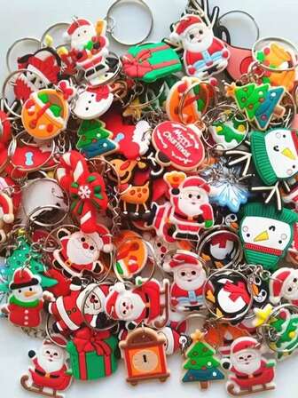 50 piezas aleatorias de llaveros de Navidad con dibujos animados, llaveros de la serie navideña con diferentes estilos, accesorios de llavero y bolso, decoración ideal para fiestas de Navidad, regalos pequeños para familiares y amigos