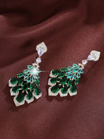 1 par de pendientes con estilo retro