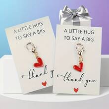 16 件套心形钥匙扣套装，含 16 张个性化感谢卡，高品质锌合金龙虾扣，是送给老师、妈妈、女朋友、闺蜜的贴心礼物，适合生日、圣诞节、感恩节、教师节、婚礼、毕业典礼等各种场合，全年皆宜。 - 多款混髮 - 查看 5