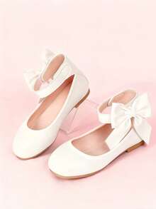 Giày búp bê trẻ em có quai buộc cổ chân và nơ trang trí, thể hiện phong cách giày thanh lịch. - trắng - Xem 15