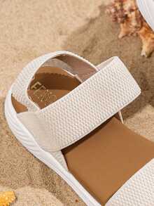 A Pair Of The Latest Summer Woven Strap Double-Band Sandals For Children - Beige Design, Comfortable, Simple, Casual And Fashionable. It Is An Excellent Choice For Daily Outings, Campus Life, Shopping In The Mall, Strolling In The Park And Playing By The Seaside. It Can Be Easily Matched With All Kinds Of Children's Clothing