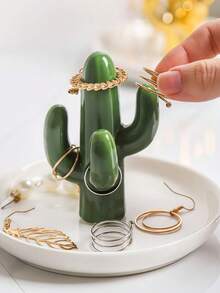 1个陶瓷仙人掌造型首饰托盘，适合存放手镯、耳环、项链等首饰，也可作装饰性多肉植物碟，是婚礼、生日礼物、家居装饰、开学礼物的理想之选。 - 彩色 - 查看 3