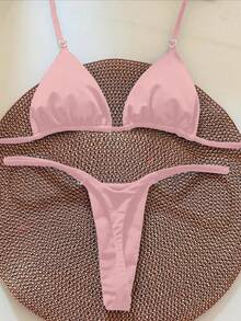 Bộ bikini tam giác màu trơn dành cho nữ, điểm nhấn là vòng tròn hình trái tim. Thiết kế cúp ngực tam giác, dây mảnh, ngọt ngào nhưng vẫn thời trang. Thích hợp cho kỳ nghỉ. - Hồng - Xem 5