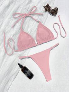 Bộ bikini tam giác màu trơn dành cho nữ, điểm nhấn là vòng tròn hình trái tim. Thiết kế cúp ngực tam giác, dây mảnh, ngọt ngào nhưng vẫn thời trang. Thích hợp cho kỳ nghỉ. - Hồng - Xem 2