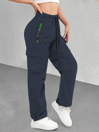 女士直筒运动裤，休闲轻便透气慢跑裤，配有撞色拉链口袋，适合多种场合