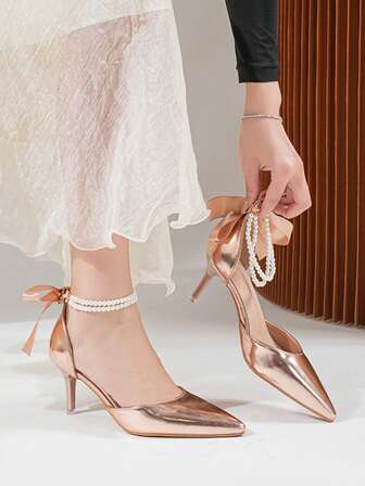 2026 Neue europäische & amerikanische Mode sexy vielseitige Perlen Spitzschuh Aushöhlung Damenschuhe, Allround-Modell mit Strass-Schleife, geeignet für alle Jahreszeiten