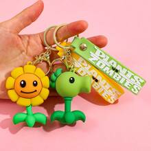 Llavero de PVC de Plantas vs Zombies, llavero de dibujos animados, decoración de bolso/coche, llavero de PVC suave de goma de Girasol/Guisante/Zombie mini, regalo de fiesta y vacaciones, pequeño regalo para niños - Multicolor - Ver 4