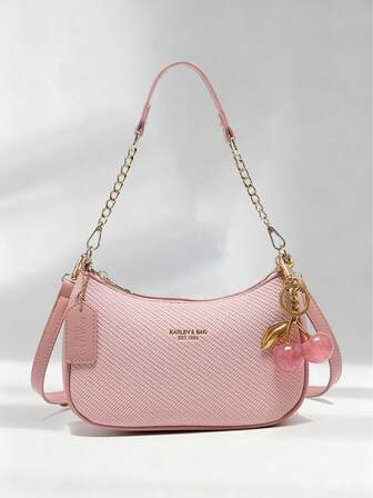 Nouveau sac à bandoulière mode classique avec motif lettre décoratif, en couleur unie, en tissu PU imperméable. Convient pour le shopping, peut être porté à l'épaule. Avec décoration pendentif cerise. Sac croissant d'été, vacances bord de mer, saison scolaire, sac à main pour femmes.