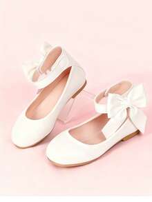 Giày búp bê trẻ em có quai buộc cổ chân và nơ trang trí, thể hiện phong cách giày thanh lịch. - trắng - Xem 16