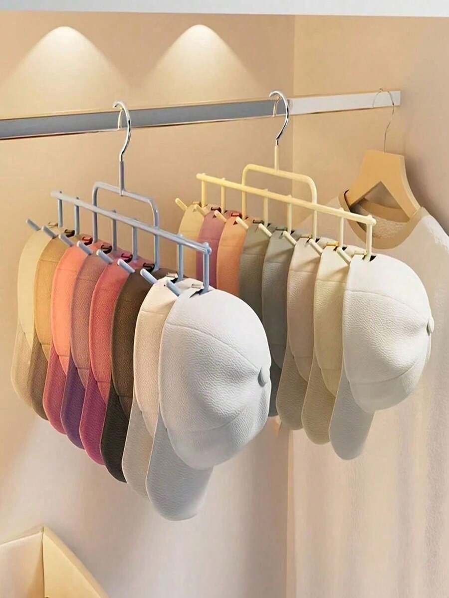 1个家用悬挂式收纳挂钩，可用于悬挂帽子、围巾和丝巾。一款适用于宿舍衣柜的悬挂式衣架，一款腰带式包包衣架，一款帽子收纳器，一款桌面帽子收纳架，采用桃色和灰色设计，一款有机衣柜式帽子收纳盒，节省空间，最多可容纳8顶帽子。