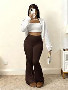 Pantalones de yoga acampanados y elásticos de cintura alta para mujer que estilizan la figura