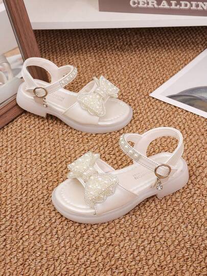 1双女童时尚新款蝴蝶水钻平底露趾公主凉鞋，软底防滑，适合跳舞，夏季