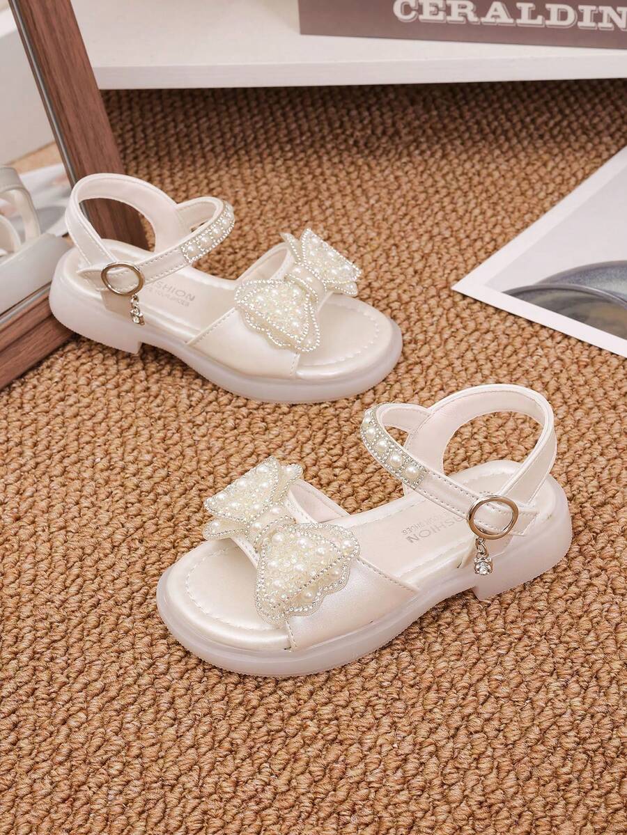 1 Đôi giày công chúa hở mũi đế bằng đính đá bướm thời trang mới cho bé gái, đế mềm chống trượt, thích hợp để khiêu vũ, mùa hè - Màu be - Xem 1