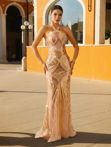 Astony One 优雅奢华金色晚礼服，性感露背设计，修身剪裁，闪亮亮片和珍珠刺绣点缀，飘逸雪纺美人鱼裙摆，是狂欢节、新年、奢华晚宴、情人节、生日派对、订婚、品牌活动、毕业典礼、红毯场合的理想之选。 - 金色 - 查看 2