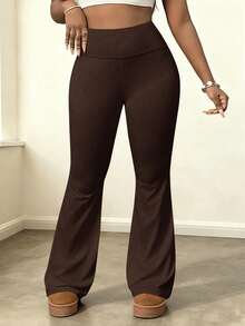 Pantalones de yoga acampanados y elásticos de cintura alta para mujer que estilizan la figura