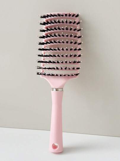 Cepillo de pelo con cerdas rosas, peine de dientes anchos y huecos