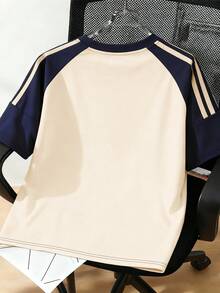 这款男童T恤采用复古蜘蛛网图案，插肩袖上饰有撞色印花。它宽松舒适，触感柔软，适合男童日常休闲穿着，也是春夏必备的短袖衬衫。 - 杏色 - 查看 3