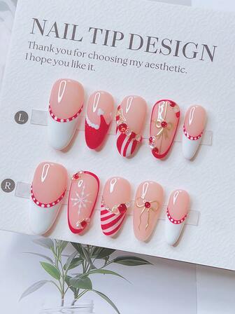 10片装Y2K风格别致杏仁形美甲贴片套装 - 手工制作，包含粉色、白色、红白法式美甲贴片，手绘金色蝴蝶结、雪花和圣诞帽图案，以及闪亮圣诞花环水钻装饰