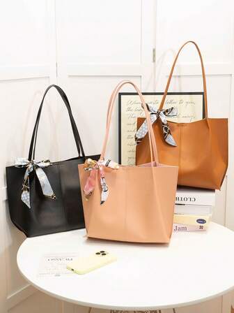 女士大容量手提包，时尚秋冬款，蝴蝶结装饰，轻便纯色，单肩背带和双提手设计，适合女性日常生活、休闲、工作通勤和上学等场合。