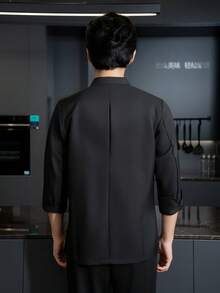 新款时尚刺绣厨师服，高端黑色男女通用长袖，适合秋冬季节，适用于高档酒店、西餐厅、快餐店、烧烤店、面包店、咖啡店等场所。吸湿排汗、抗皱、抗起球、防缩水、不变形。面料柔软亲肤。经典立领设计，优雅隐形纽扣，穿着舒适便捷。 - 黑色 - 查看 7