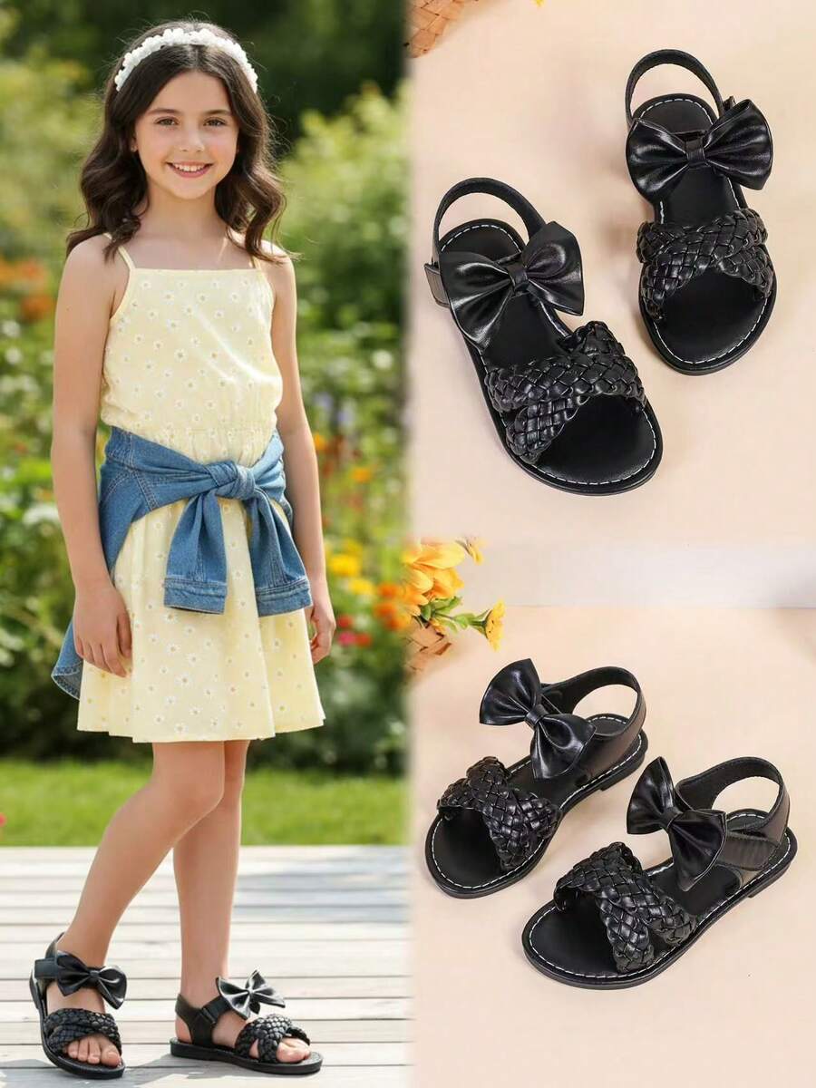 1 par de sandalias planas de color negro para niñas y niños de talla grande, de 3 a 15 años, con decoración de lazo grande tejido de unicolor, cierre con correa, punta redonda y abierta, sandalias romanas de moda y lindas, adecuadas para uso casual, fiesta, viaje, primavera/verano 2025