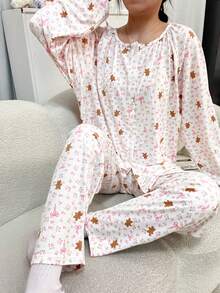 两件套女士睡衣套装，圆领开衫饰有可爱小熊图案，搭配花卉蝴蝶结印花、长袖上衣和长裤，面料舒适，适合春、秋、冬三季穿着，休闲家居服。 - 粉色 - 查看 3