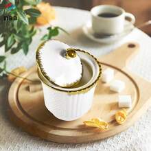 一套带盖金色装饰的糖罐，12盎司陶瓷糖罐，优雅浮雕金色把手，适用于咖啡吧，白色厨房装饰配件，陶瓷食品储物罐，带盖，可用于盛放咖啡粉、茶叶、糖、香料等。 - 彩色 - 查看 4