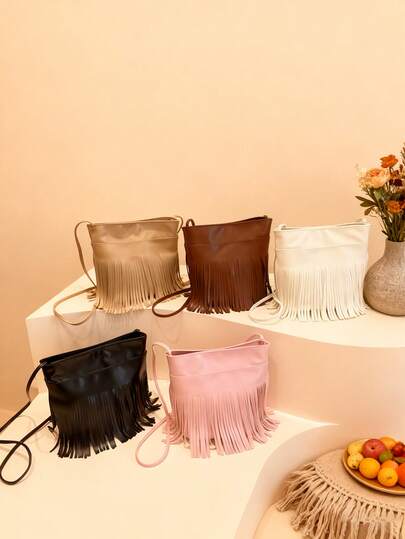 This Fashionable Solid Color American-Style Fringe Shoulder/Crossbody Bag Features A PU Zipper Closure And A Unique Design. The Adjustable Strap Makes It Suitable For Daily Use. This High-Quality Bag Is Great For Shopping, Commuting, And Everyday Use For Teenagers, And Also Makes A Wonderful Gift.