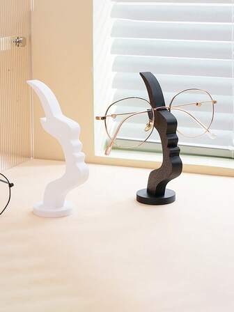 Glasögonplaceringsfäste i form av en remsa, intressanta och enkla glasögonfästesornament på människors sida av ansiktet.