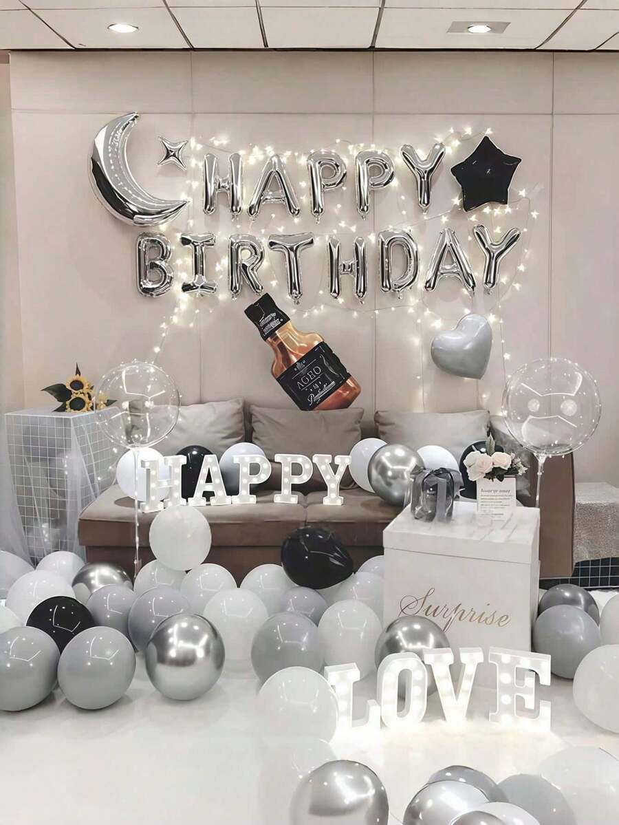 这款包含40个银色、黑色和灰色生日快乐气球装饰套装，包括金属质感的月亮、星星和心形铝箔气球，以及纯色乳胶气球。简约优雅，是成人派对和周年庆典的完美之选。 - 彩色 - 查看 1