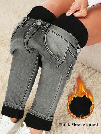 冬季保暖厚款中腰水洗弹力紧身牛仔裤，带猫须细节，适合办公室日常穿着