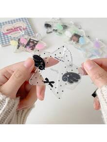 1个ins风闪亮星星卡通天使翅膀钥匙扣，透明吊坠相框