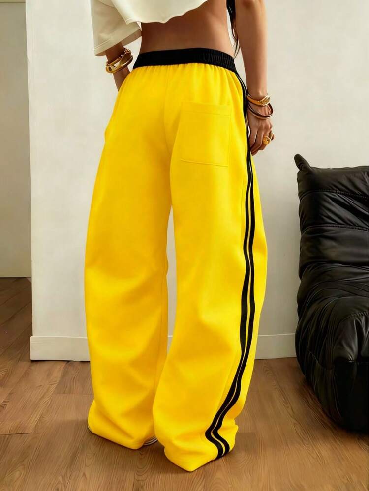 Pantalones casuales relajados con cordón de contraste de otoño/invierno, pantalones deportivos de pierna ancha con bolsillo de raya lateral de cintura alta recta estilo estadounidense, patchwork holgado para baile y deporte de primavera - Amarillo - Ver 6