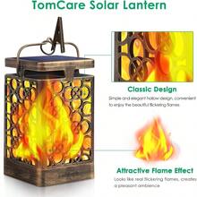 TomCare - Linterna solar mejorada con llama parpadeante para colgar al aire libre iluminacion decorativa luces LED impermeables con energia solar para sombrilla para patio jardin terraza paquete de 2 Bronce - Bronce - Ver 2