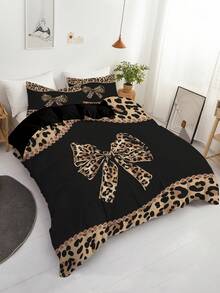 3件套豹纹蝴蝶结床上用品套装（1个被套+2个枕套，不含被芯），采用性感迷人的豹纹印花设计，柔软亲肤，缓解视觉疲劳，四季皆宜，拉链封口，适用于酒店、卧室、客房和宿舍的床上用品装饰，低致敏性，易于护理，时尚轻盈，透气性好。 - 彩色 - 查看 6