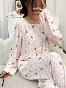 两件套女士睡衣套装，圆领开衫饰有可爱小熊图案，搭配花卉蝴蝶结印花、长袖上衣和长裤，面料舒适，适合春、秋、冬三季穿着，休闲家居服。 - 粉色 - 查看 7
