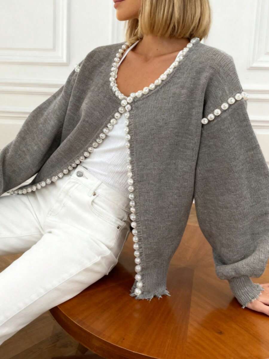 纯色开衫，珍珠饰边做旧下摆，长袖，优雅针织毛衣