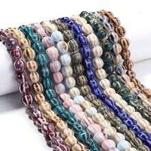 1 chuỗi gồm khoảng 28 hạt gốm hình quả bí ngô sọc tráng men cổ điển, kích thước 11.5mm, dùng để làm trang sức, đồ thủ công, mặt dây chuyền, đồ trang trí. - Hình quả bí ngô tráng men hoa - Xem 2