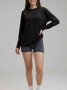 Camiseta deportiva casual y holgada para mujer con cuello redondo y mangas largas, adecuada para otoño e invierno. - Negro - Ver 4