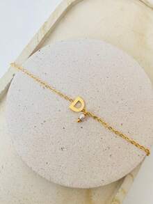 Pulseira Inicial D Banhada a Ouro 18k com Pérola de Madrepérola - Dourado - Visão 3
