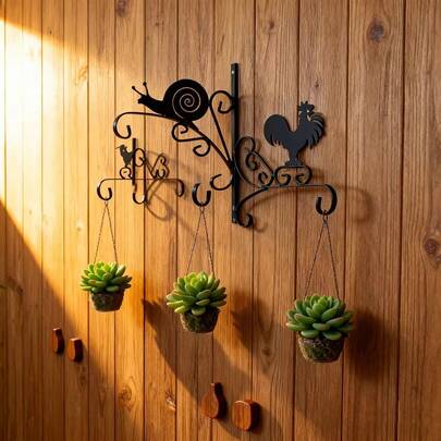 Retro Black Ironwork Animal Wall Hanging Hook With Intricate Carvings And Curved Arm Design, Perfect For A Nordic-Style Wall Decoration.