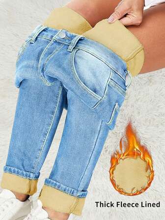 冬季保暖厚款中腰水洗弹力紧身牛仔裤，带猫须细节，适合办公室日常穿着