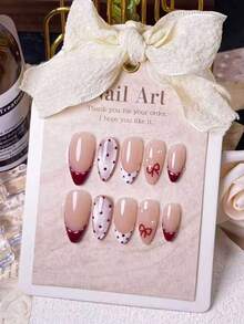 10片杏仁形红色法式波点猫眼蝴蝶结美甲贴片，手工绘制红色法式甲尖，优雅猫眼效果和波点图案，饰以手工红色蝴蝶结美甲用品 - 彩色 - 查看 11