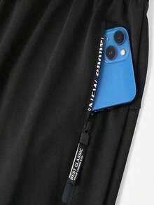 男士速干运动跑步裤，带拉链口袋、弹性抽绳腰带和修身裤脚 - 黑色 - 查看 6