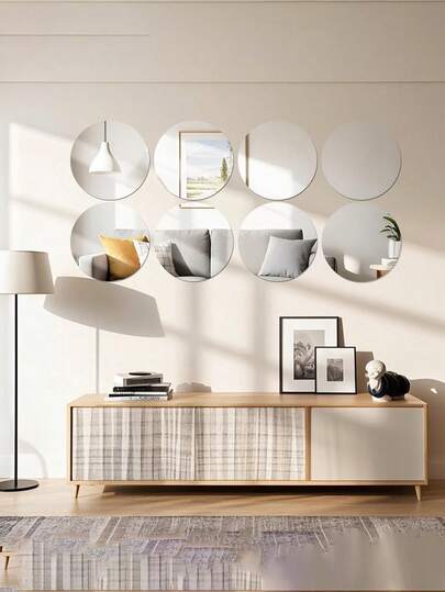 10片装亚克力圆形镜贴，非玻璃材质，是家居墙面装饰或婚礼餐桌摆饰的理想之选。适用于房间、浴室、梳妆镜装饰，20厘米银色亚克力圆形镜。