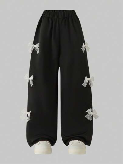 女童宽松纯色蝴蝶装饰九分阔腿裤，四季皆宜的休闲裤