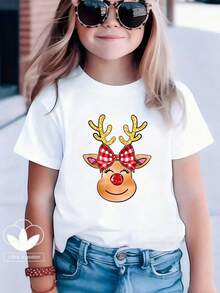 Esta nueva camiseta de manga corta para niñas, 100% algodón, luce modernos estampados de Reno de Navidad, informal y versátil. Confeccionada con un tejido suave y delicado con la piel, es suave con la piel sensible de tu hija, permitiéndole libertad de movimiento y comodidad durante reuniones familiares, actividades escolares o juegos al aire libre. - Blanco - Ver 1
