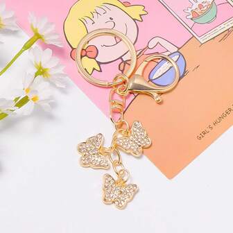 1pc Luxury Rhinestone Butterfly Golden Key Chain, Metal Small Gift Keyring, Earphone Case Pendant