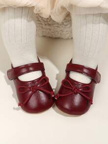 1双女婴纯色蝴蝶结PU魔术贴防滑透气幼儿鞋，0-15个月，甜美优雅，适合春秋季穿着